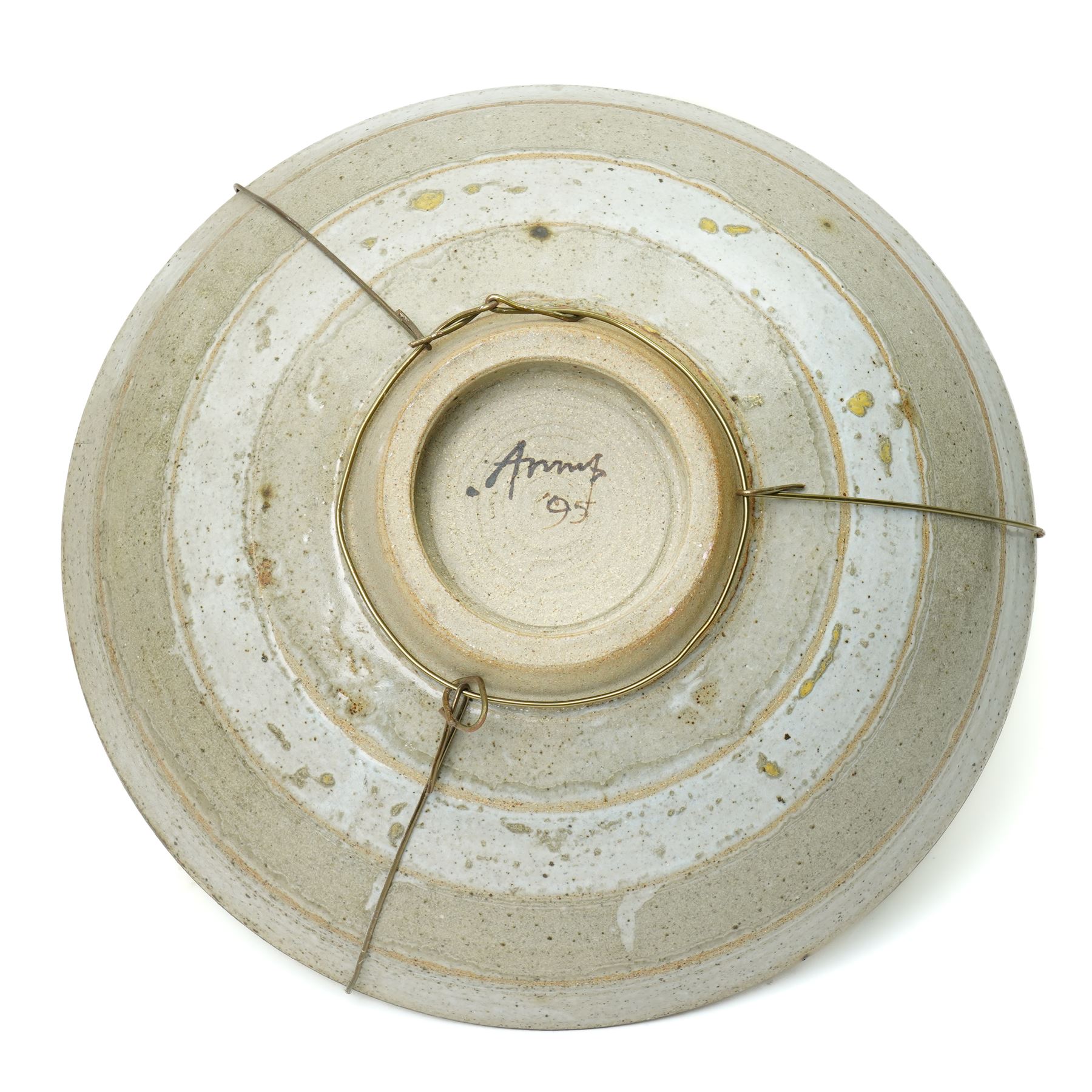 Mick Arnup (British 1925-2008): stoneware bowl, decorated in mottled glaze with abstract floral decoration, incised signature to base D37cm 