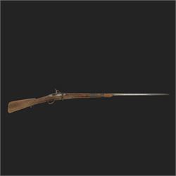 Middle Eastern percussion cap rifle, the 107cm  barrel with four brass bands and ramrod under, overall L143cm, together with another percussion rifle the 106cm barrel a copy of a 17th century Spanish barrel, complete with fake stamp, by vendors repute this rifle was confiscated from tribesmen in Kurdistan by police
Sold as an exempt item under Section 58 (2) of the 1968 Firearms Act, to be held as a curiosity or ornament