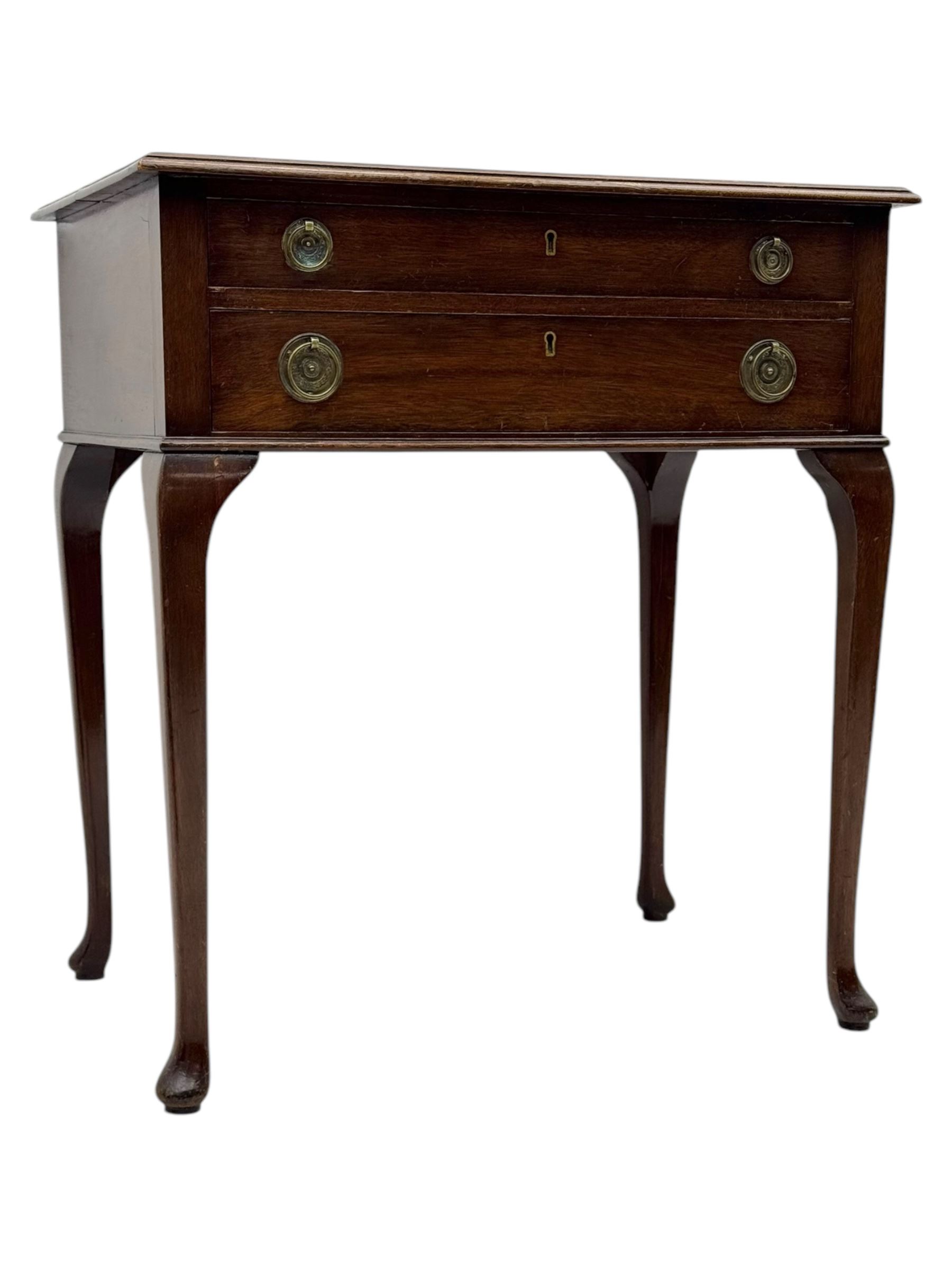Walker & Hall - Edwardian mahogany canteen, rectangular top with moulded edges, two drawers enclosing silver plated cutlery, raised on cabriole supports 