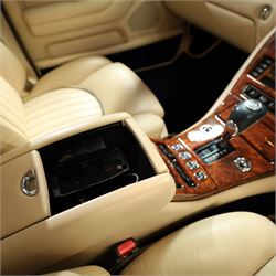 2001 Bentley Arnage Red Label Saloon

Registration: BU51 TGX
Engine: 6.75-litre turbocharged V8 petrol
Transmission: Automatic
Odometer reading: 39,942 miles
Colour: Black Sapphire metallic
Interior: Magnolia leather with burr walnut veneers
Previous owners: 3
V5C: Present
Service history: Good service records

An exceptional Bentley Arnage Red Label Saloon, finished in Black Sapphire metallic, a very dark blue, with a Magnolia leather interior, contrasting dark blue carpets and extensive burr walnut veneers. The car displays an odometer reading of approximately 39,942 miles.

The Arnage Red Label combined Bentley’s renowned 6.75-litre turbocharged V8 engine with automatic transmission, delivering effortless performance in a traditionally appointed luxury saloon. The model is distinguished by its imposing proportions, characteristic Bentley radiator grille and finely crafted interior.

Presented in excellent condition throughout, the bodywork and metallic paint finish appear particularly well preserved, complemented by clean brightwork and the correct Bentley alloy wheels. The engine bay is also notably well detailed.

The interior presents exceptionally well, retaining its Magnolia leather upholstery, polished burr walnut veneers, original factory instrumentation and switchgear. The leather displays only light creasing consistent with careful use.

The car has had three previous owners and is accompanied by good service records.

Features

• 6.75-litre turbocharged V8 petrol engine
• Automatic transmission
• Black Sapphire metallic paintwork
• Magnolia leather interior
• Contrasting dark blue carpets
• Burr walnut veneers
• Electrically adjustable front seats
• Air conditioning
• Factory instrumentation and switchgear
• Bentley alloy wheels
• Right-hand drive
• Odometer reading of approximately 39,942 miles
• Three previous owners
• Good service records
• V5C present

This vehicle forms part of the Estate of the Late John Sills and is offered for sale by the Executors, confirming a genuine reason for sale.