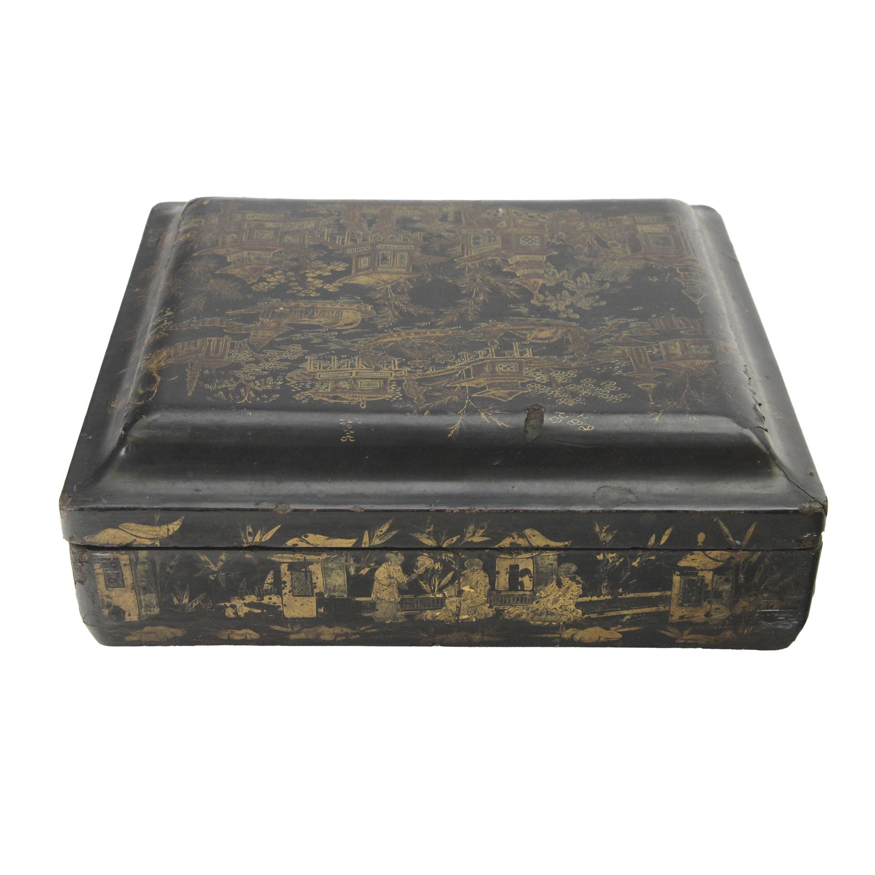 19th century Chinese export black lacquered games box, of rectangular form decorated to the exterior with figures, pagodas and bridges in a riverside landscape in red and gilt, the lift off cover opening to reveal a compartmented interior with four removable covered boxes decorated with conforming figural scenes, and eight trays decorated with stylised suits, H10cm W30cm D27cm