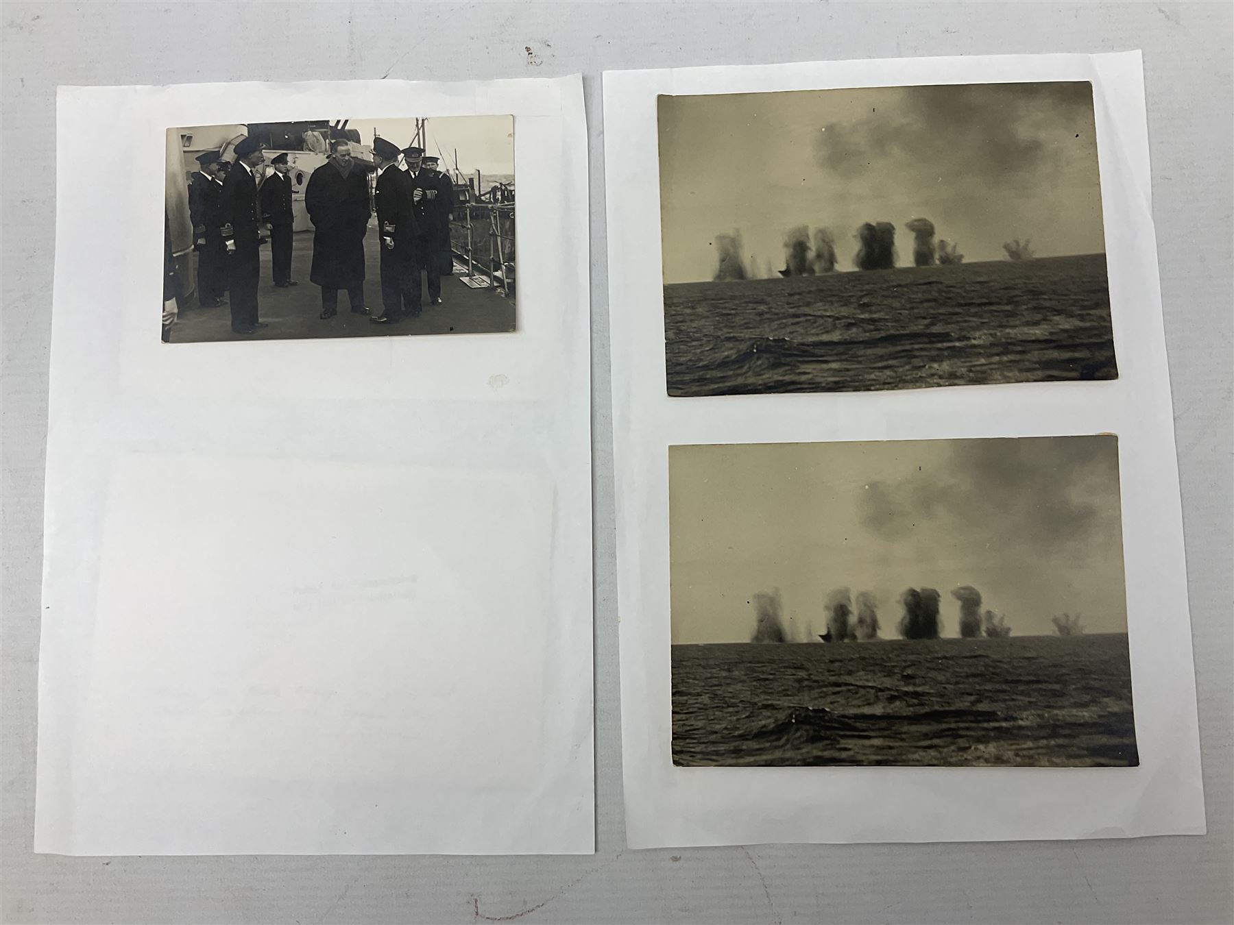 WW2 Royal Naval group of eight medals comprising OBE, hallmarked silver Distinguished Service Cross inscribed verso Lieut. J.R. McCluskie RNVR 1945, 1939-1945 Star, Atlantic Star, Africa Star, 1939-1945 War Medal, Defence Medal and Royal Naval Patrol Service Medal inscribed Lieutenant J.R. McCluskie Royal Naval Patrol Service; with seven original photographs of a sea battle 27th November 1940 against the Italian Fleet and another photographic postcard of Sir Stafford Cripps arriving on board one of the vessels.