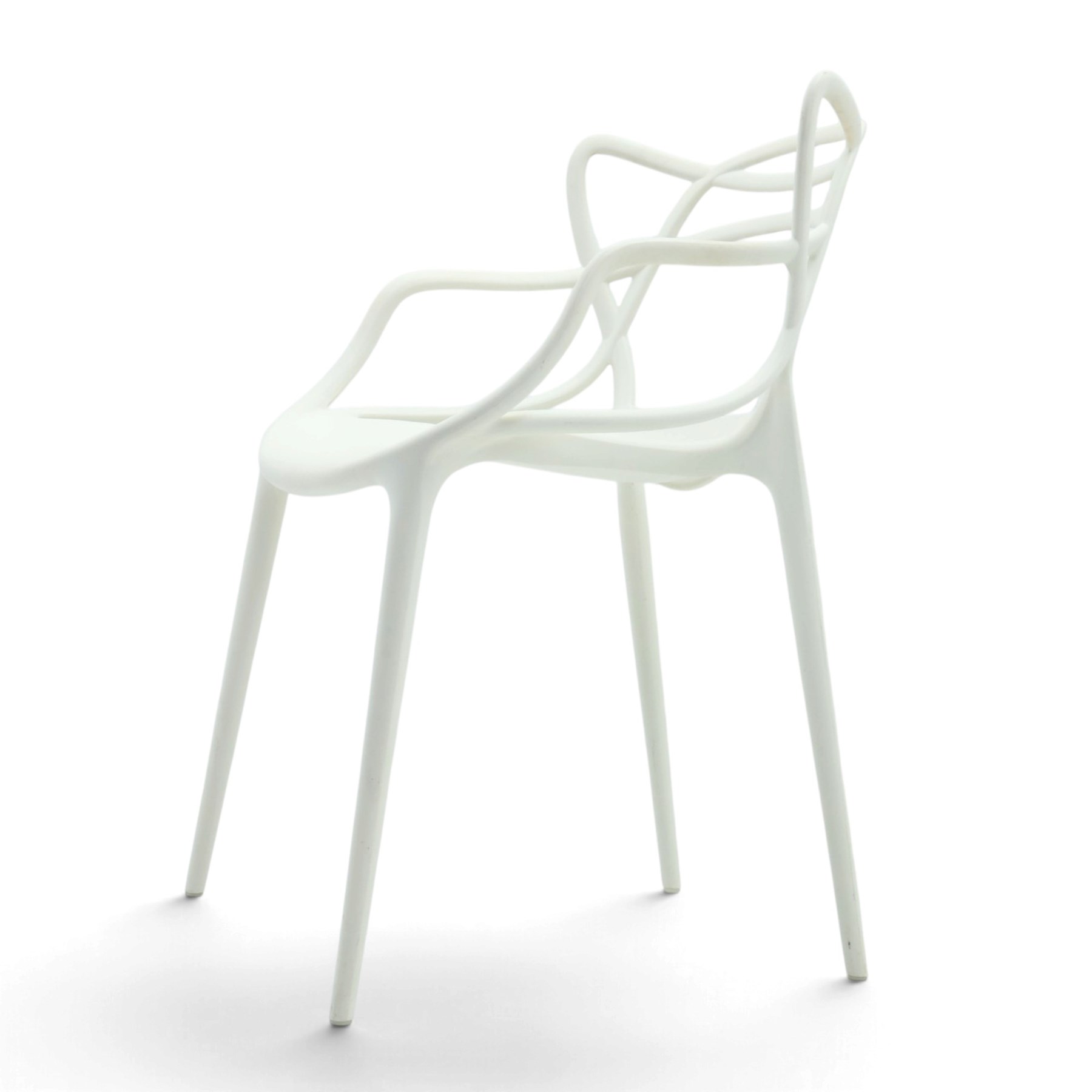 Philippe Starck (1949-) with Eugeni Quitllet (1972-) - Kartell ‘Masters’ armchair, white moulded plastic construction, intertwined curvilinear back with integral arms, dished seat raised on slender tapering legs