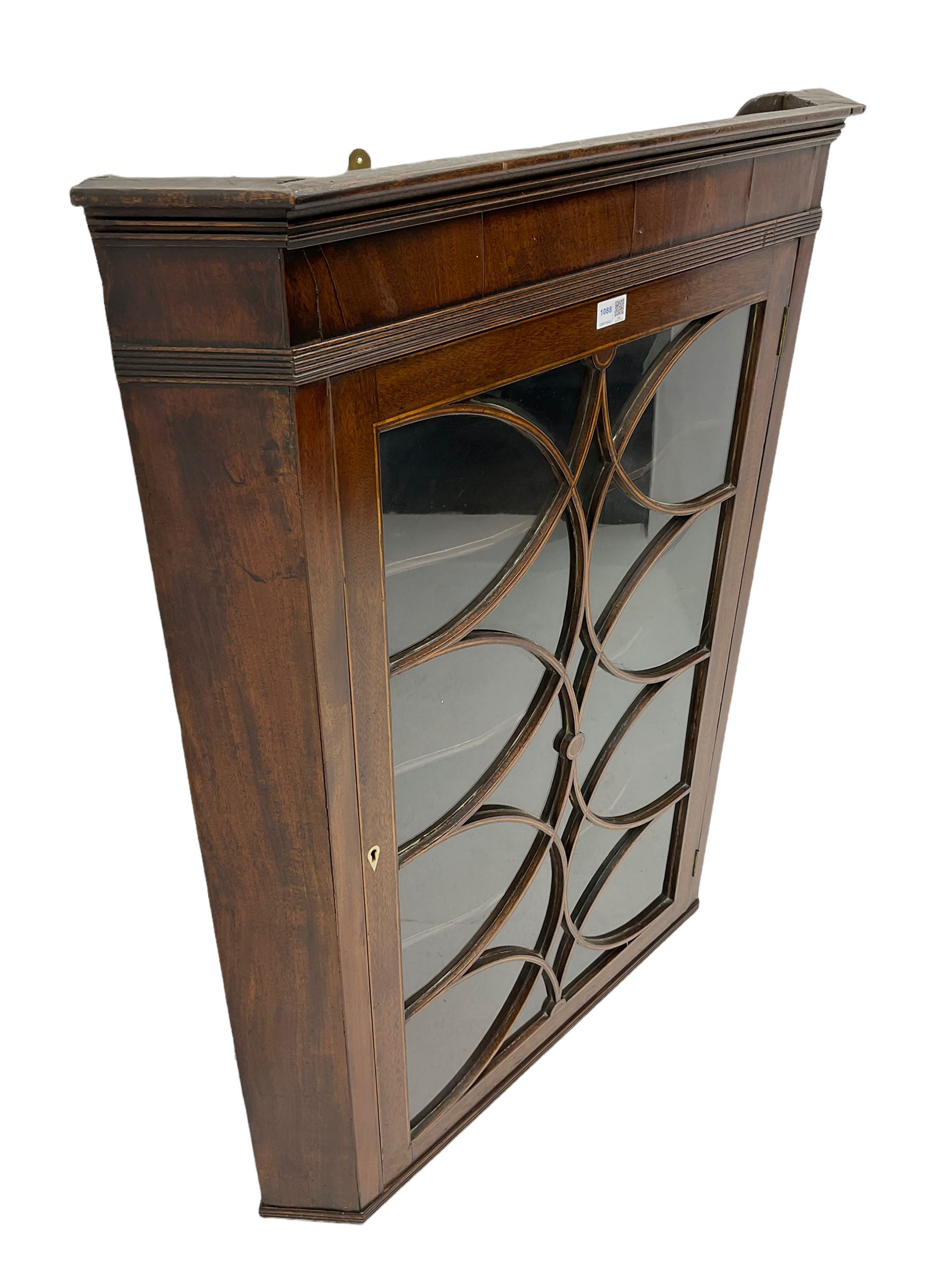 Georgian mahogany wall hanging corner cabinet, enclosed by single door with curved interlacing astragal glazing 
