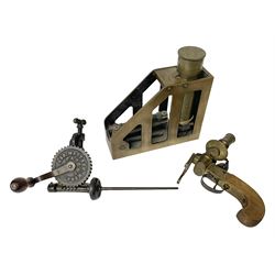 Cambridge Scientific Instruments Co clinometer, flintlock tinder lighter, and a Anders Mattson Mora patent bobbin winder (3)
