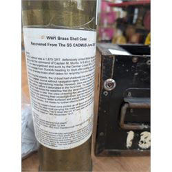 WWI brass shell case, by vendor repute salvaged from SS Cadmus wreckage site June 2007 off Flamborough Head, together with a reproduction RMS Lusitania medal in box and a metal tin