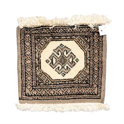 Long flatweave Kilim textile cushion, in crimson and decorated with geometric motifs and cotton fringe ends, 151cm, together with four modern hand-knotted rug mats with geometric designs, the largest 65x43cm, (5)