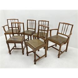 'Acornman' set six oak dining chairs, shaped cresting rail over triple turned spindle back, turned front supports connected by H stretcher carved with the acorn signature, two carvers and four side chairs, by Alan Grainger of Brandsby, York