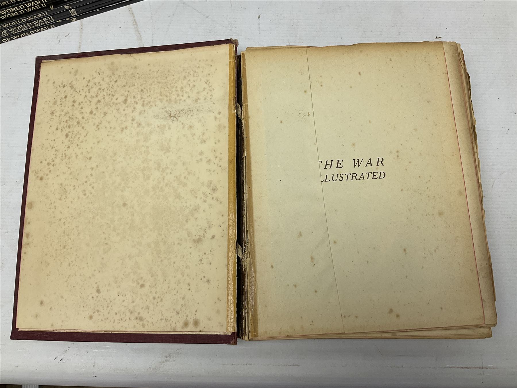 Three boxes of books, periodicals and DVDs of military interest with particular emphasis on WW2 including The History of World War Two in thirty original parts by Orbis, The D-Day Experience by Richard Holmes, The World War Two Databook, The World at War, Special Forces etc