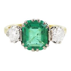 Early 20th century gold three stone transitional cut diamond and octagonal cut emerald rin...