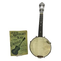 George Formby banjolele with metal plaque to headstock L55cm; in carrying case with instruction booklet.