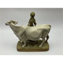 Royal Dux figure of a Milkmaid with Cow, number 988 with applied pink triangle mark to base, H28cm