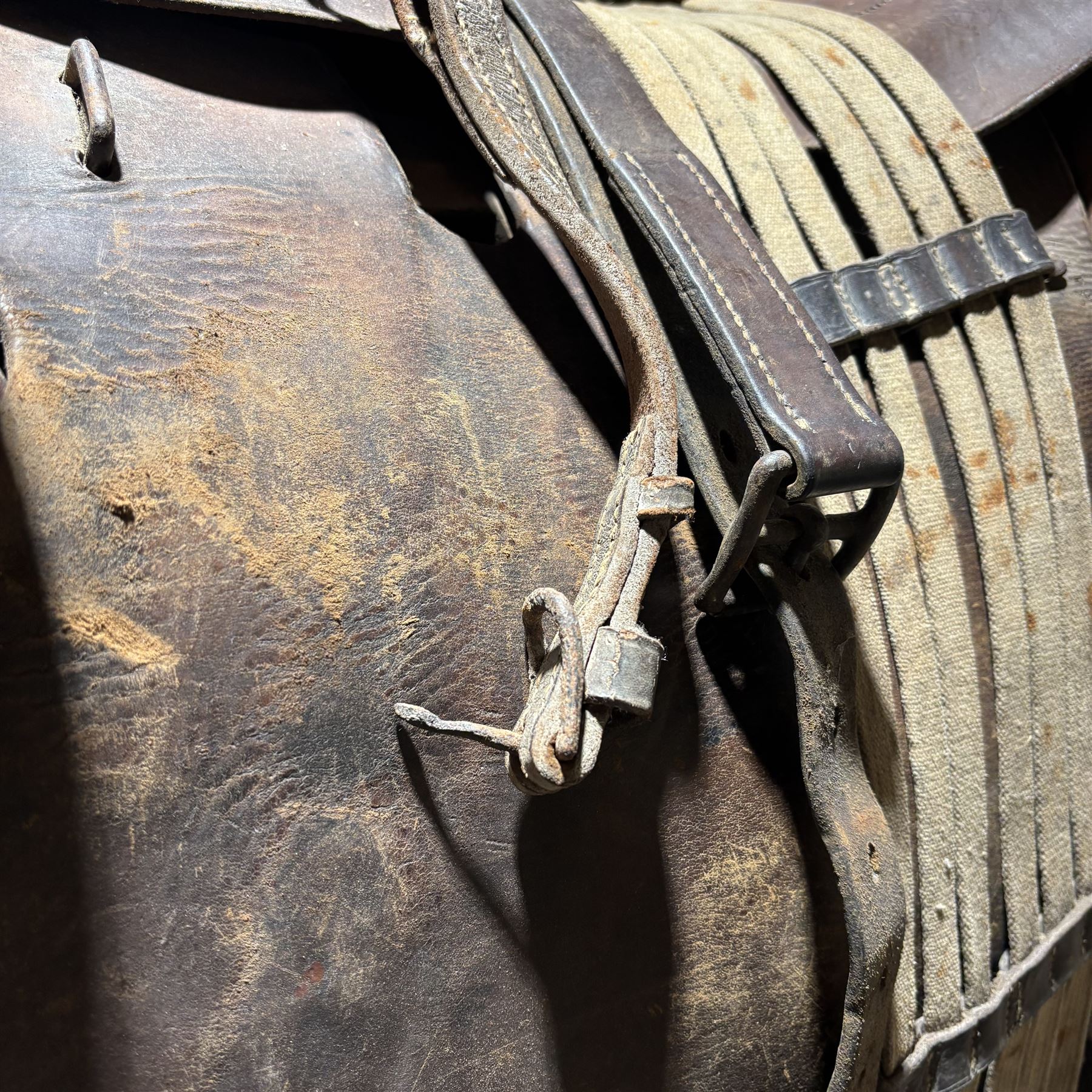 WWI French cavalry 17'' saddle, model 1916, with leather saddle bags, stirrups, girth and bit  