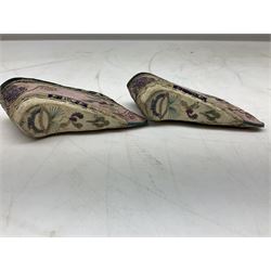 French silver plated wine taster of typical form, stamped, together with a silver plated napkin ring, and an 'Alpaca Silver' pill box with mother of pearl detailed cover, (3) together with Two pairs of late 19th/early 20th century Chinese Lotus shoes for binding feet, the first with purple silk heavily embroidered with ornate floral motifs, L10cm the second larger fuschia and black pair with thicker sole embroidered with flowers, L14cm