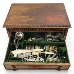 Early 20th century oak cased canteen on barleytwist stand, hinged top with fitted baized lined interior, above a drawer fitted for cutlery