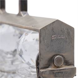 Mappin & Webb silver plated tantalus, with three square glass decanters each with silver plate collars, complete with key, H29cm