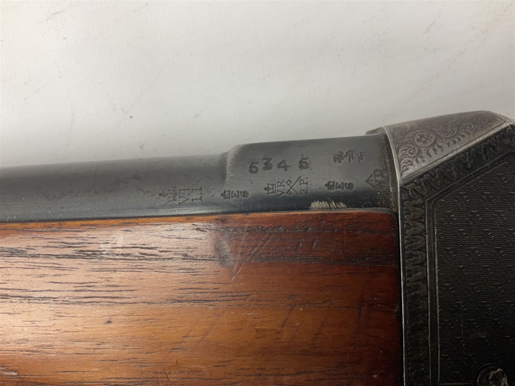 Manton .577/450 Martini Henry rifle, the 82.5cm smooth bored barrel proofed for shot, two barrel bands and bayonet fitting, engraved action with side safety, figured walnut stock with chequered steel butt plate, complete with ramrod, NVN other than 5346 on barrel, L125cm