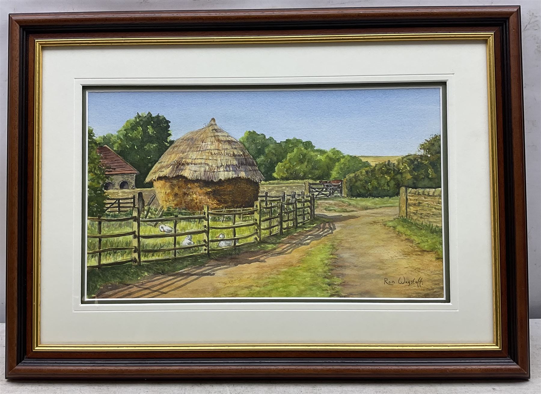 Ron Wagstaff (Northern British 20th Century): 'High and Dry - Norfolk', 'Haystack and Yard - Beamish', 'Newark Fairground' and Farmyard Landscapes, collection of five watercolours signed, variously titled verso max 35cm x 44cm (5)