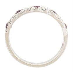 White gold garnet and diamond half eternity ring, nine alternating round brilliant cut diamonds and round cut garnets, stamped 18ct, total diamond weight approx 0.30 carat