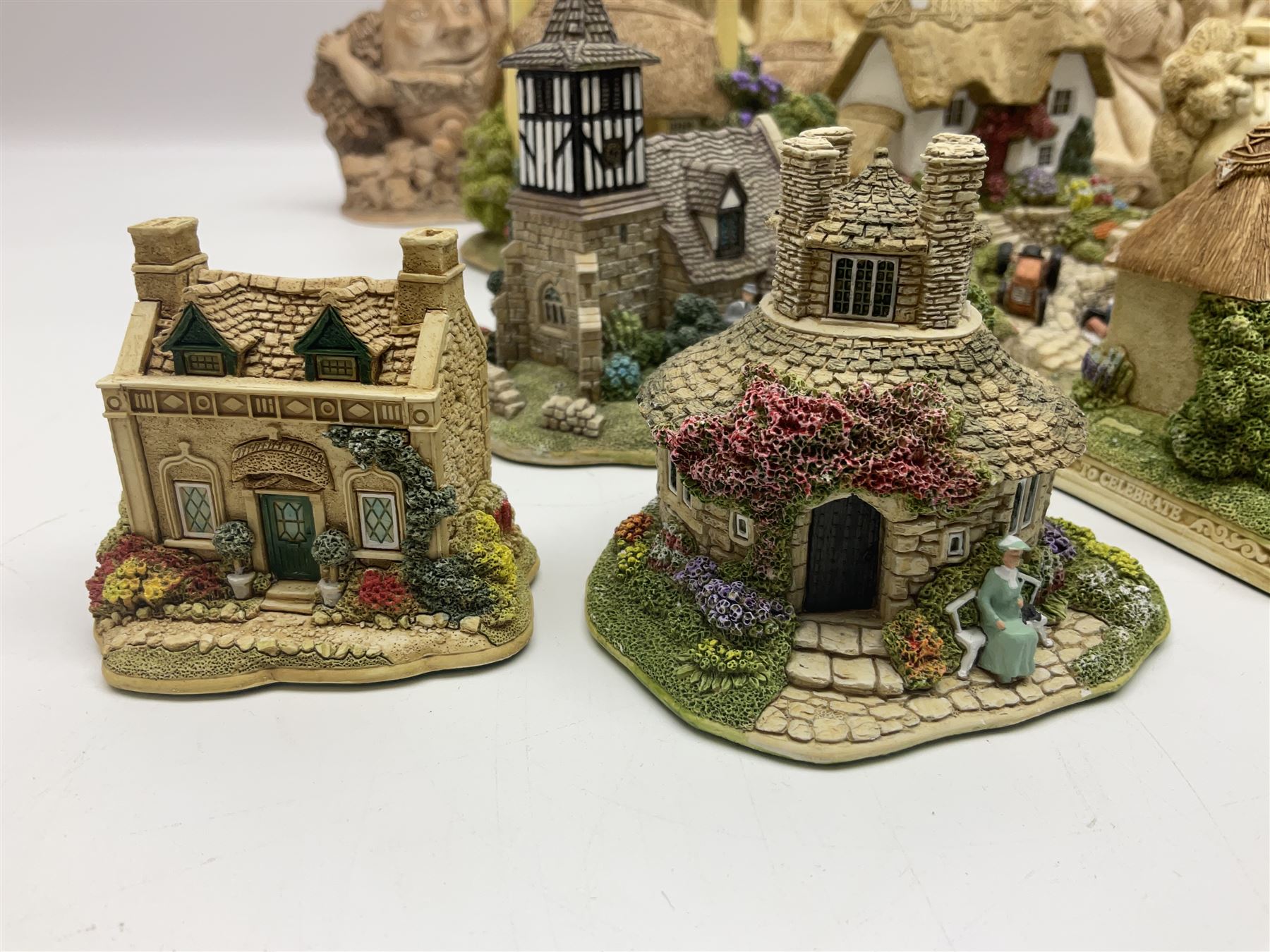 Thirty three Lilliput Lane models from the British collection and paint your own Children's Plaques, to include I am a little teapot, Gnome improvements, Dennis the Dragon, Bill and Ben, The Bobbins etc, some with boxes and deeds 