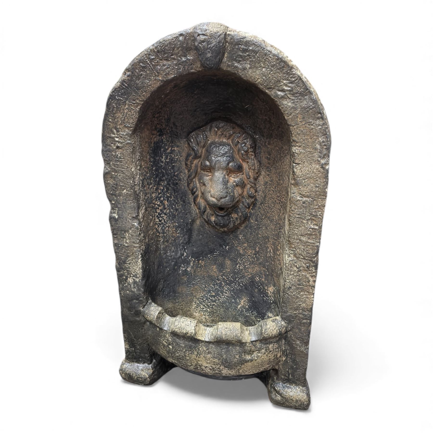 Cast stone fountain with lion mask