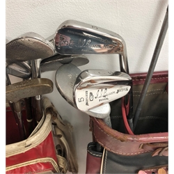  Eleven steel shafted golf clubs by Smithson Dewsbury G.C. etc comprising three woods and eight irons, together with two John Letters putters - 'Golden Goose' and 'Silver Swan' - in two carry bags with balls, head-covers etc  
