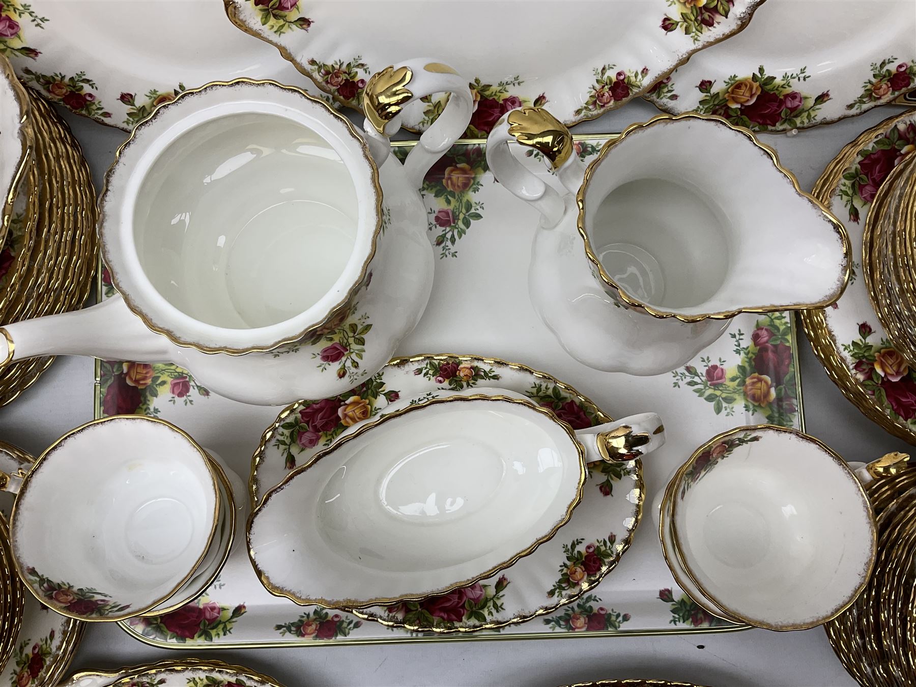 Royal Albert Old Country Roses pattern tea and part dinner service, to include teapot, two open sucriers, two jugs, thirteen cups and saucers, sixteen dessert plates, two cake plates, twelve dinner plates, sauce boat and saucer, etc (approx 114) 