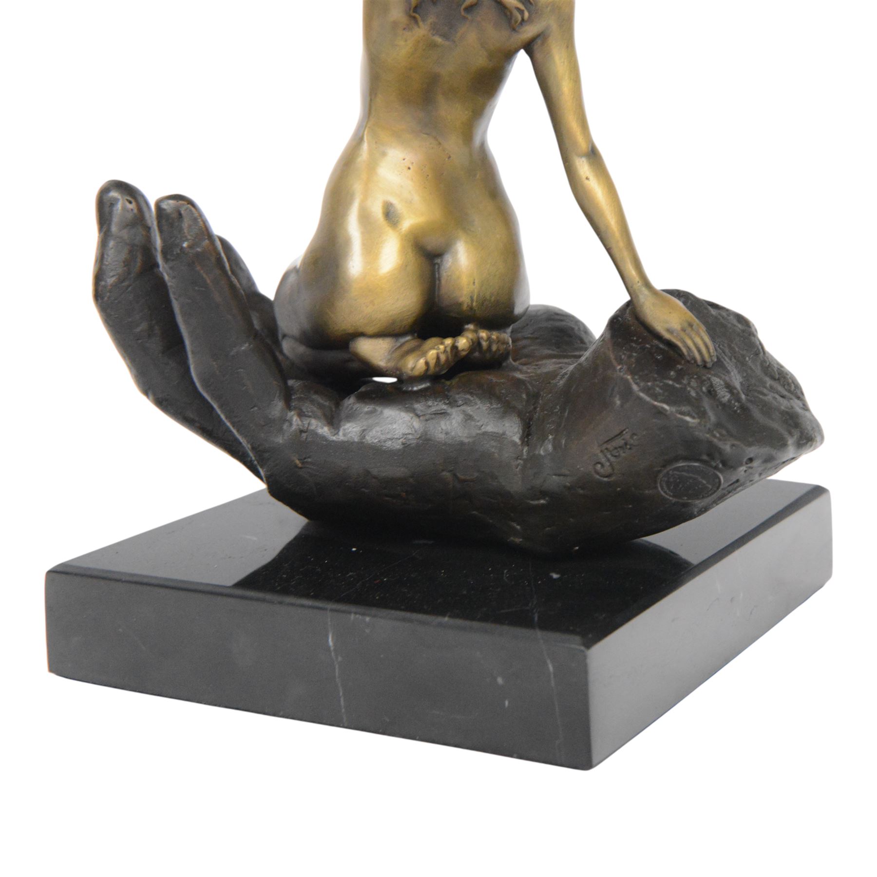 Nude In Hand bronze sculpture modeled as a female nude seated in a hand upon a marble base, signed June H24cm   