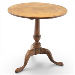 Georgian oak tripod table, plank top raised on a turned baluster column, raised on cabriol...