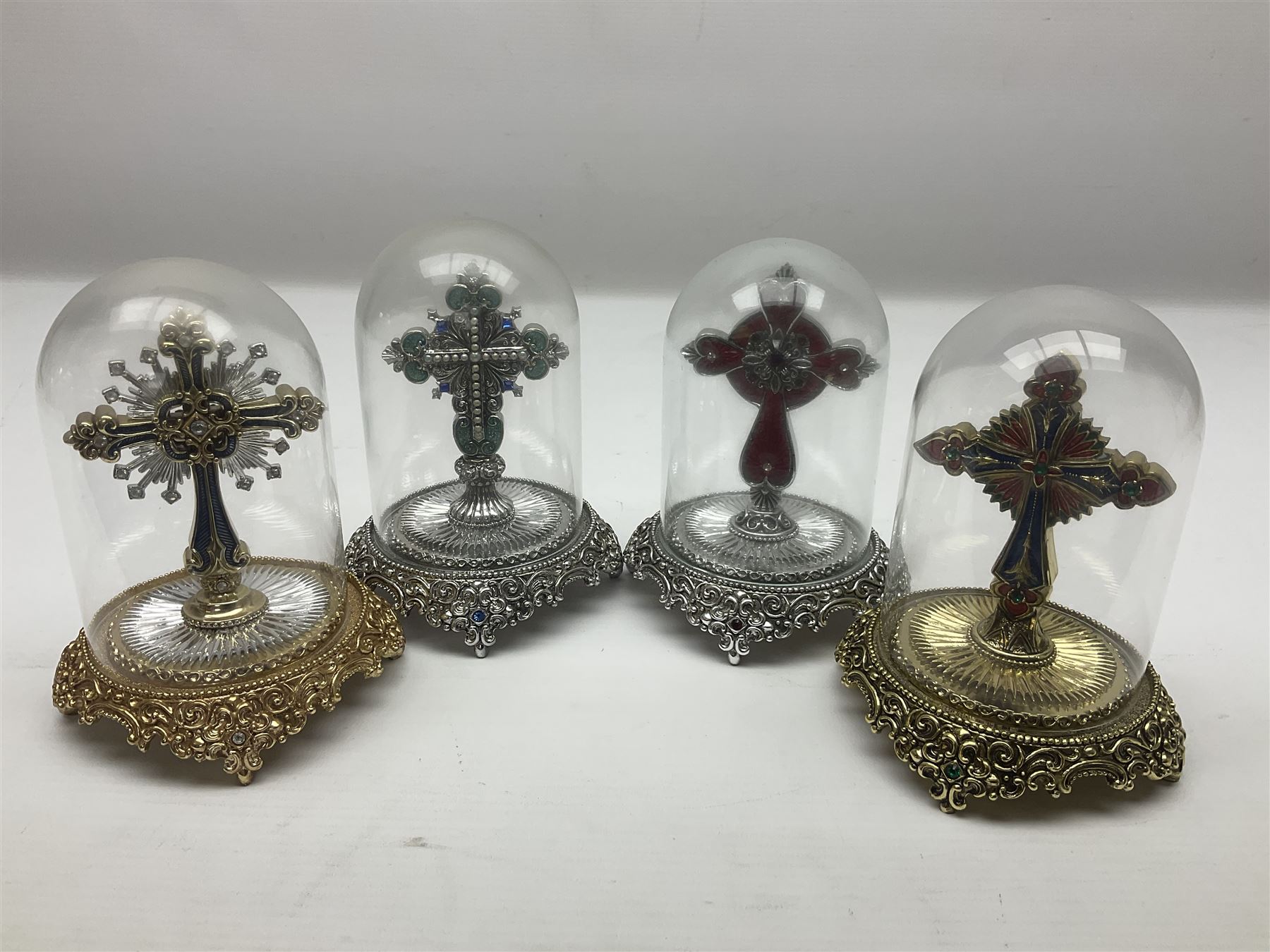 Four limited edition Franklin Mint House of Fratelli Coppini crosses, to include Majestic Cross, Sacred Cross, Star of Hope Jewelled Cross and The Gates to Paradise Cross, all under glass domes, H13cm