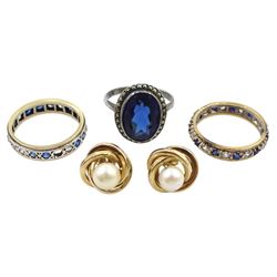Two gold stone set full eternity rings, pair of gold pearl stud earrings, all 9ct and a silver blue paste stone and marcasite ring