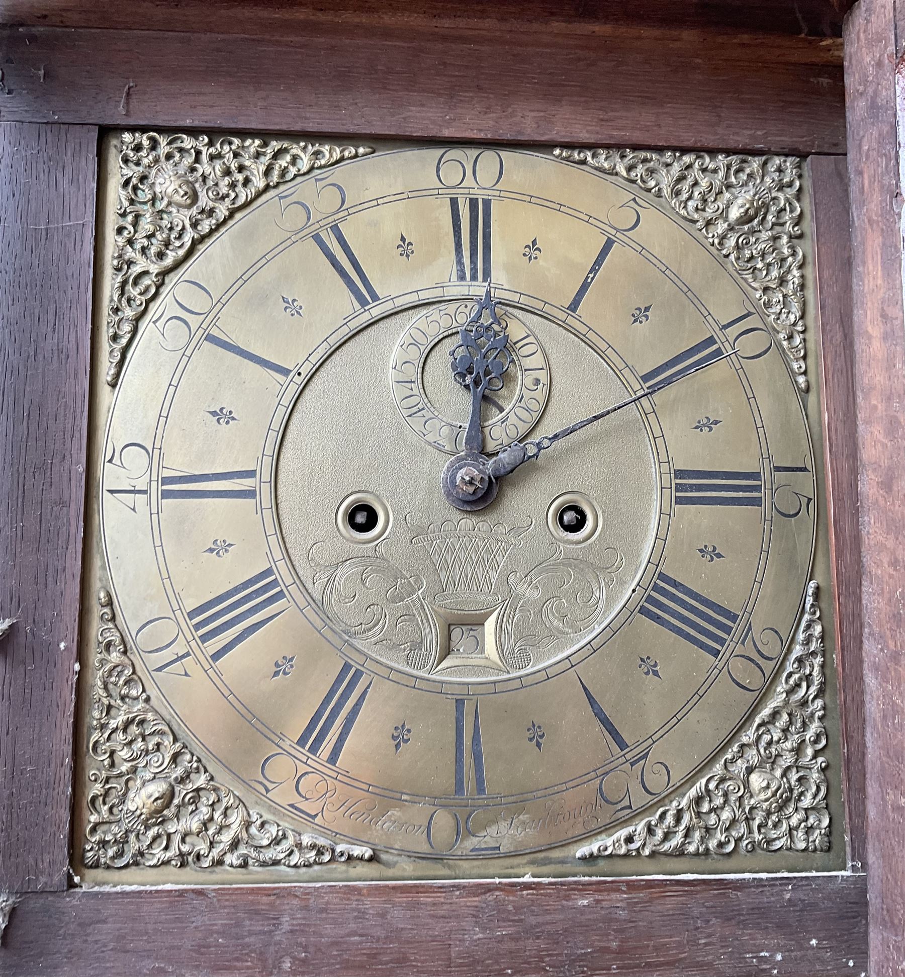 Robert Henderson of Scarborough -mid-18th century eight-day longcase clock c1750, with a flat topped pediment and broad cornice, carved frieze beneath and a square hood door flanked by detached pilasters with gesso capitals, profusely carved trunk with a break arch topped door on a square plinth raised on a shaped base, brass dial with a matted and engraved dial centre, cast spandrels and chapter with Roman numerals and five minute Arabic's, with a seconds dial and date aperture, dial pined directly to a rack striking movement with a recoil anchor escapement, sounding the hours on a bell. With weights and pendulum.
Robert Henderson was one of the first clockmaker recorded as working in Scarborough, b1678-d1756.

