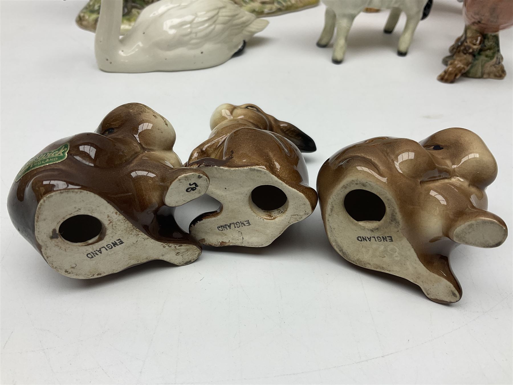 Group of Beswick figures to include leopard no 1082, rabbits, swan, pheasant no 1226 etc, all with marks beneath