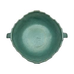 Roseville pottery twin handled bowl, decorated with clematis on a blue ground, marked ‘Roseville USA 457-8’ to the base