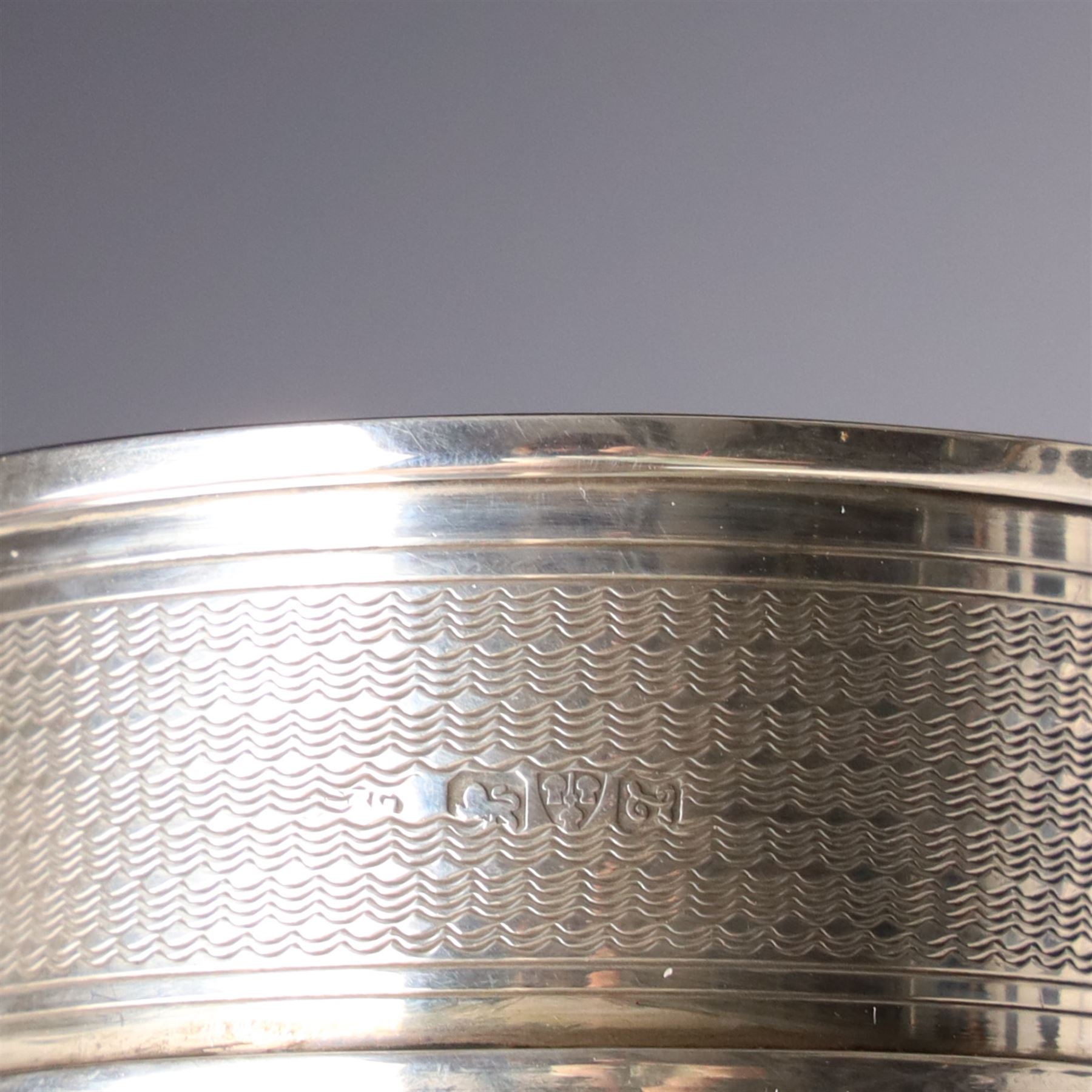 Silver cigarette box with presentation inscription, the hinged cover engraved with the crest of The Worshipful Company of Painter-Stainers W14cm London 1965 Maker Cohen & Charles and a silver napkin ring