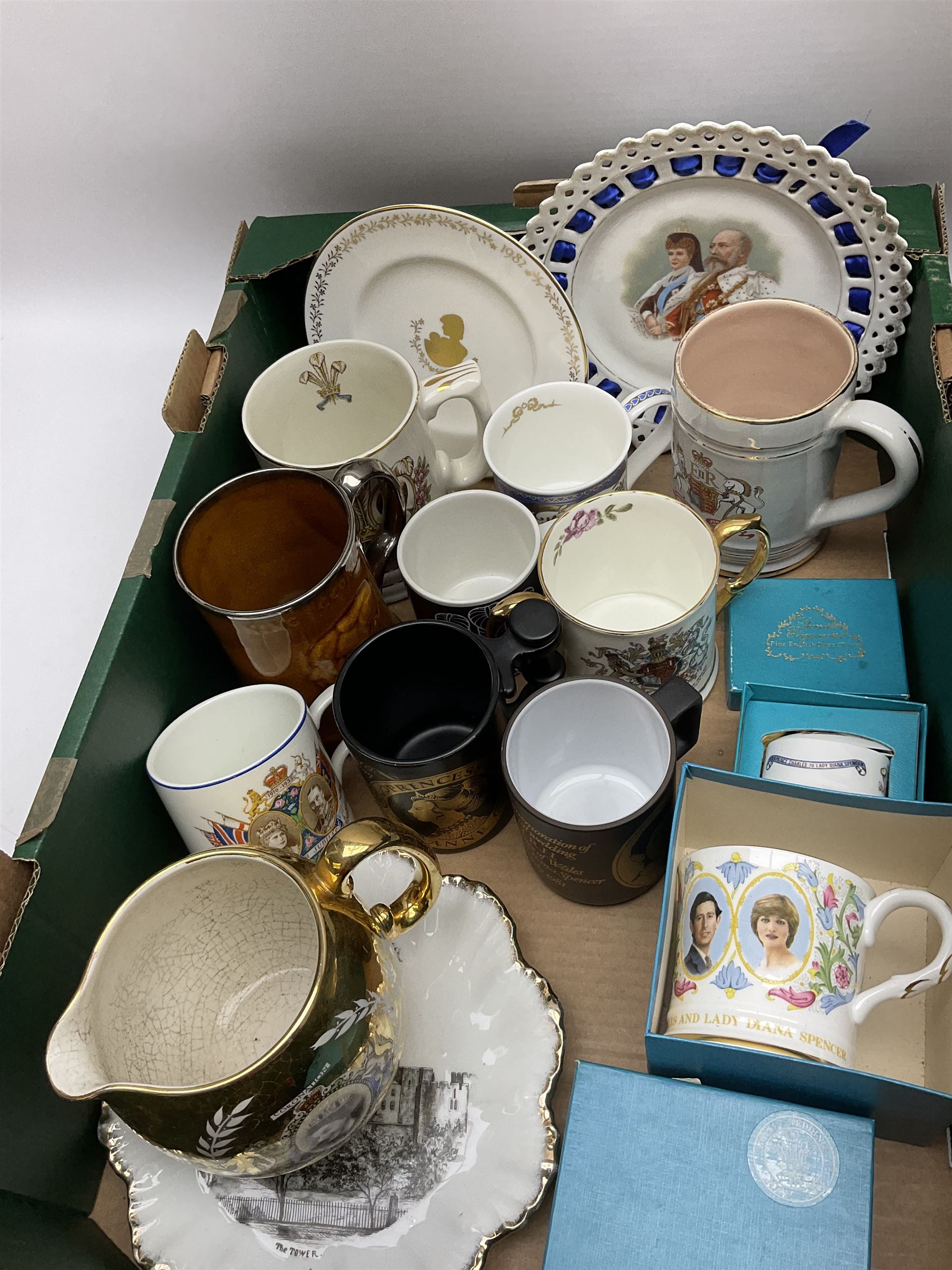 Commemorative ware ceramics to include Portmeirion 'A year to Remember' Royal Wedding mug, Ridgways George VI tankard, Hornsea Charles and Diana mug and a quantity of other commemorative mugs and plates etc in two boxes