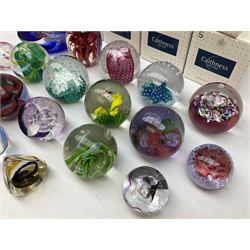Eighteen Caithness paperweights, to include Myriad, Escapade Fascination, Crystal Voyager, Festive Snowflake, Moon Crystal, etc, 