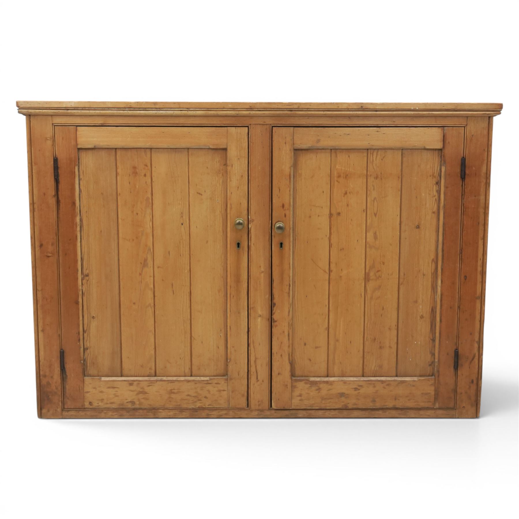 Victorian waxed pine low cupboard, fitted with two panelled doors and panelled sides, two interior shelves