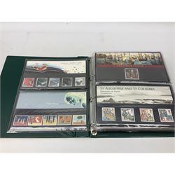 Queen Elizabeth II mint decimal stamps in presentation packs, face value of usable postage approximately 700 GBP, housed in four ring binder folders