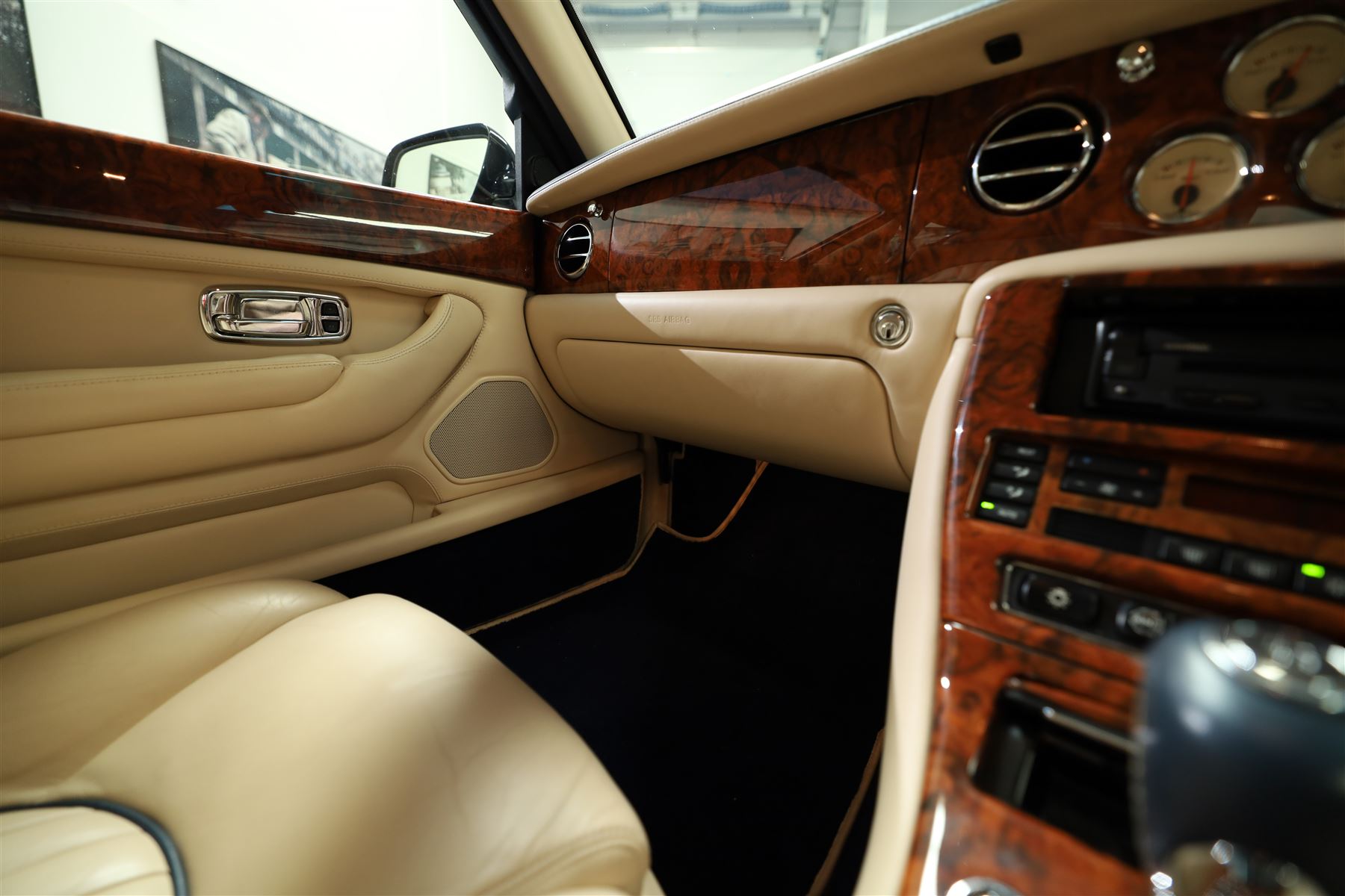 2001 Bentley Arnage Red Label Saloon

Registration: BU51 TGX
Engine: 6.75-litre turbocharged V8 petrol
Transmission: Automatic
Odometer reading: 39,942 miles
Colour: Black Sapphire metallic
Interior: Magnolia leather with burr walnut veneers
Previous owners: 3
V5C: Present
Service history: Good service records

An exceptional Bentley Arnage Red Label Saloon, finished in Black Sapphire metallic, a very dark blue, with a Magnolia leather interior, contrasting dark blue carpets and extensive burr walnut veneers. The car displays an odometer reading of approximately 39,942 miles.

The Arnage Red Label combined Bentley’s renowned 6.75-litre turbocharged V8 engine with automatic transmission, delivering effortless performance in a traditionally appointed luxury saloon. The model is distinguished by its imposing proportions, characteristic Bentley radiator grille and finely crafted interior.

Presented in excellent condition throughout, the bodywork and metallic paint finish appear particularly well preserved, complemented by clean brightwork and the correct Bentley alloy wheels. The engine bay is also notably well detailed.

The interior presents exceptionally well, retaining its Magnolia leather upholstery, polished burr walnut veneers, original factory instrumentation and switchgear. The leather displays only light creasing consistent with careful use.

The car has had three previous owners and is accompanied by good service records.

Features

• 6.75-litre turbocharged V8 petrol engine
• Automatic transmission
• Black Sapphire metallic paintwork
• Magnolia leather interior
• Contrasting dark blue carpets
• Burr walnut veneers
• Electrically adjustable front seats
• Air conditioning
• Factory instrumentation and switchgear
• Bentley alloy wheels
• Right-hand drive
• Odometer reading of approximately 39,942 miles
• Three previous owners
• Good service records
• V5C present

This vehicle forms part of the Estate of the Late John Sills and is offered for sale by the Executors, confirming a genuine reason for sale.