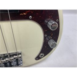 Fender Precision Bass guitar, in Olympic White finish with tortoiseshell effect scratchboard, serial no US15103092, in black Fender hard case with Fender strap and warranty card, guitar L116cm