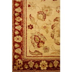  Persian beige ground rug with floral decoration, 157cm x 94cm  