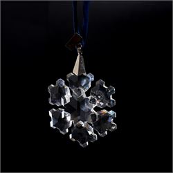 Eight Swarovski crystal snowflake Christmas ornaments, comprising years 1991-1998, some with certificates, boxed (8)