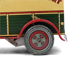 Wells Brimtoy tinplate clockwork 'Express Transport' delivery van, green body with cream roof and red highlights, with lithographed details, fixed key, H7.5cm, L17cm