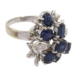 Oval cut sapphire and diamond cluster ring