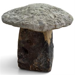 Pair of 19th century weathered hewn sandstone two-piece staddle stones, domed circular top over a tapering base