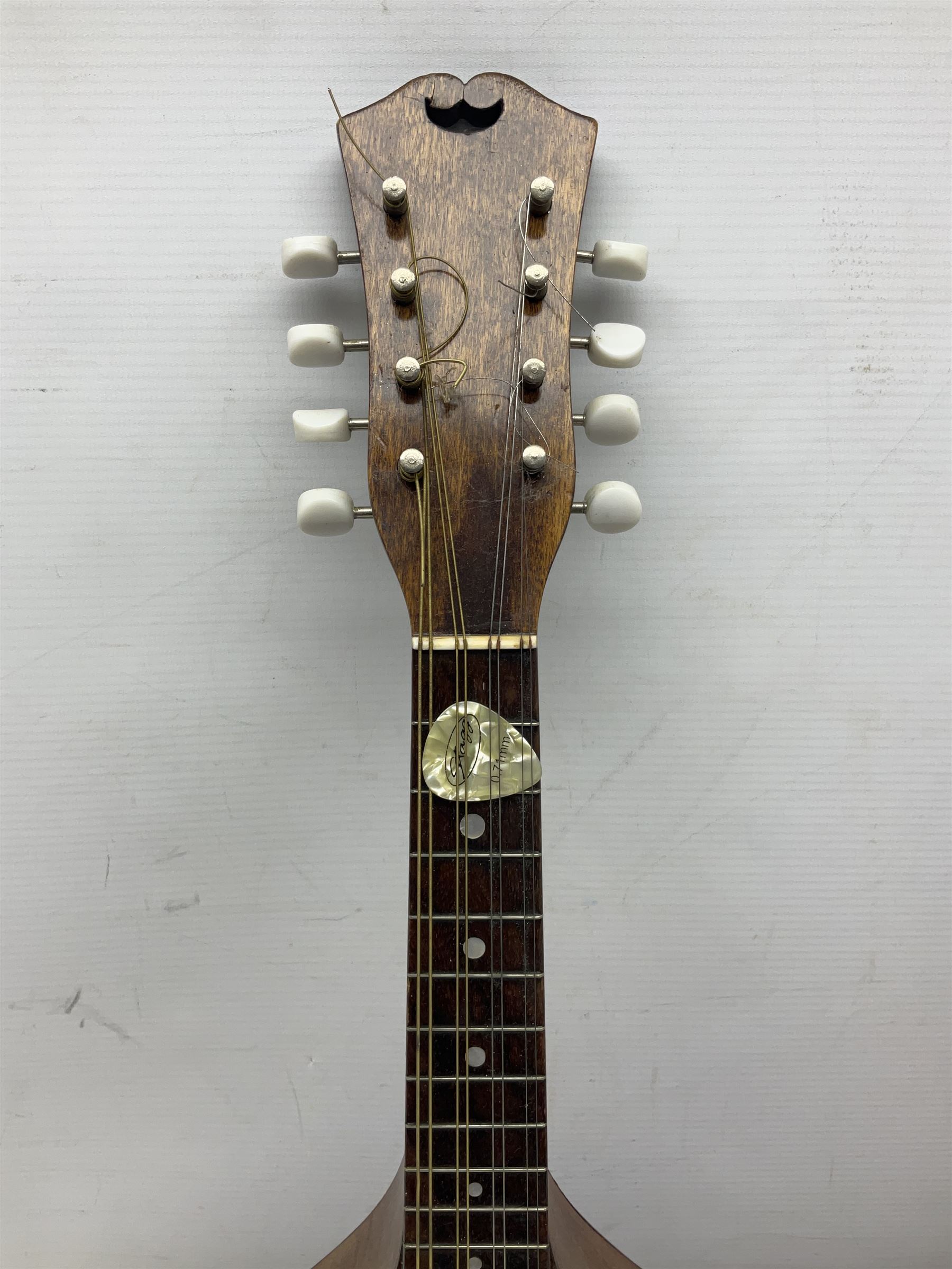 Italian eight-string mandolin with maple back and ribs and spruce top with inlaid floral marquetry panel within a fragmented mother-of-pearl border L61cm; cased; and a (damaged) German 'Michigan' mandolin for spares or repair (2)