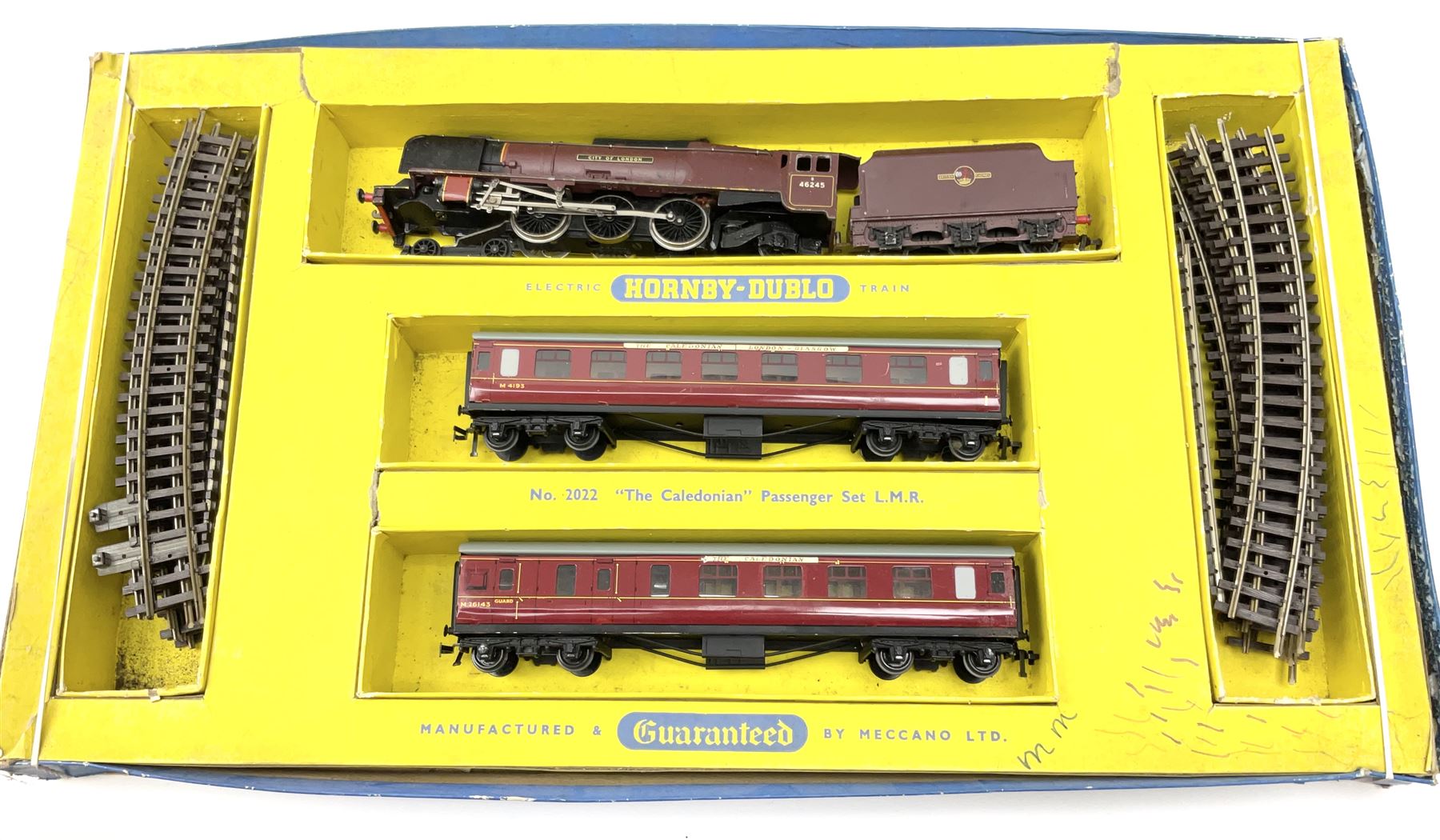 Hornby Dublo - two-rail 2022 'The Caledonian' Passenger Set LMR with Duchess Class 4-6-2 locomotive 'City of London' No.46245 with tender, two coaches and track, box base only, no lid; 4MT Standard 2-6-4 Tank locomotive No.80033 with two Talisman coaches and track in 2019 Goods Train Set box; four unboxed wagons, quantity of track, crane and buffer stops.