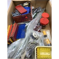 Meccano - large quantity of sections, various colours and ages, including long length angled strips and girders, hub discs, circular girders, various flat and flanged plates, wheels, nuts and bolts, digger buckets, funnels, chains, threaded rods and axle rods etc