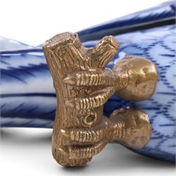 Pair of wall sconces, modelled as blue parrot upon a gilt branch, H47cm